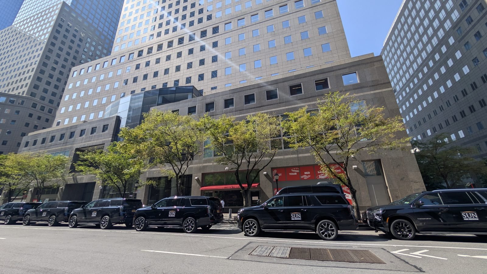 Sun Global Transportation SUV fleet lined up in Lower Manhattan, New York